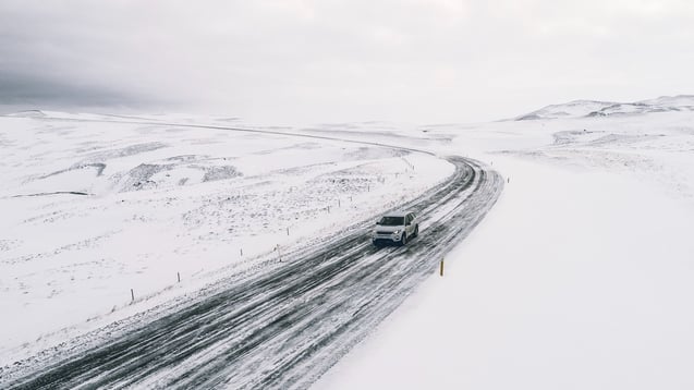 Car on Snowy Road