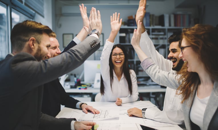 Happy team high fiving