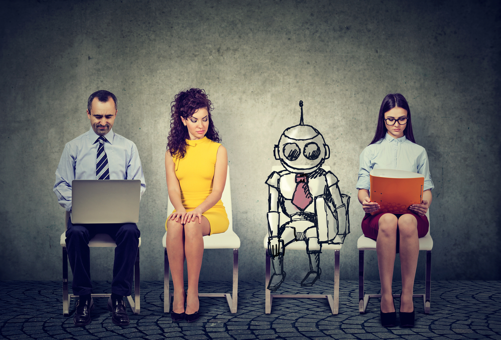 People sitting with robot