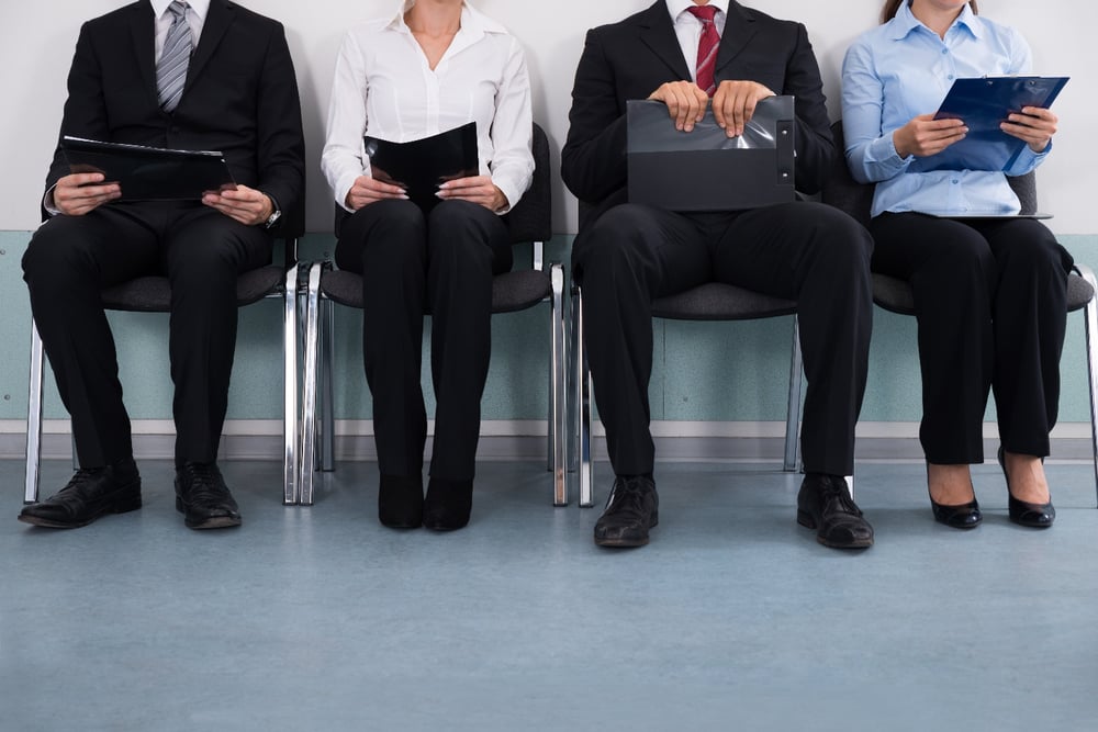 Business people sitting and waiting