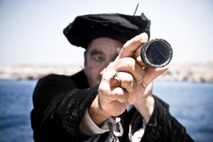 Pirate man with telescope